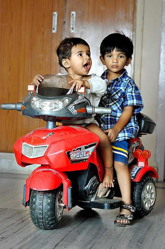 Kids on Toy Bike