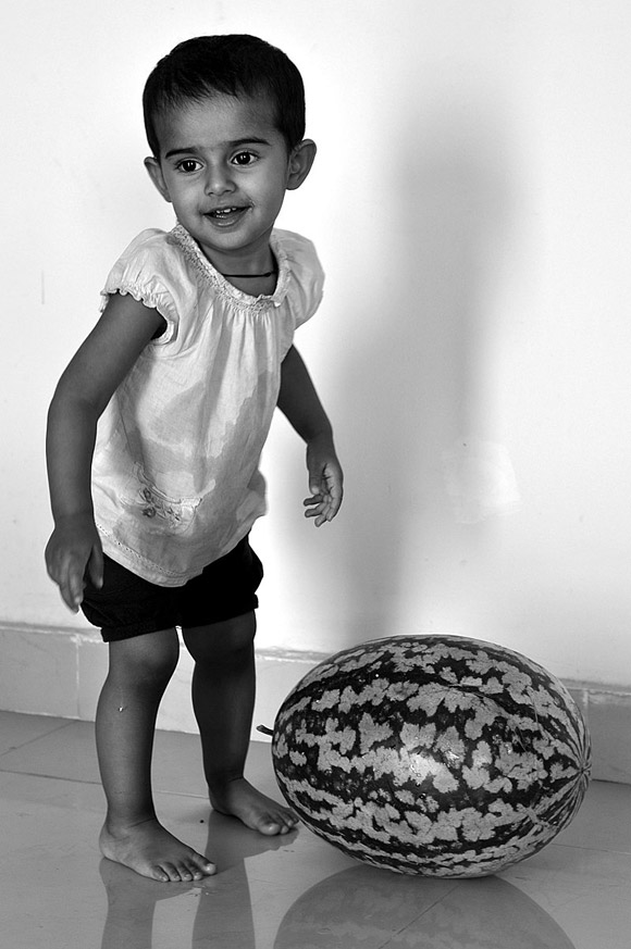 Child posing with watermalon